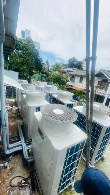 Qualitair rooftop air conditioning condenser maintenance